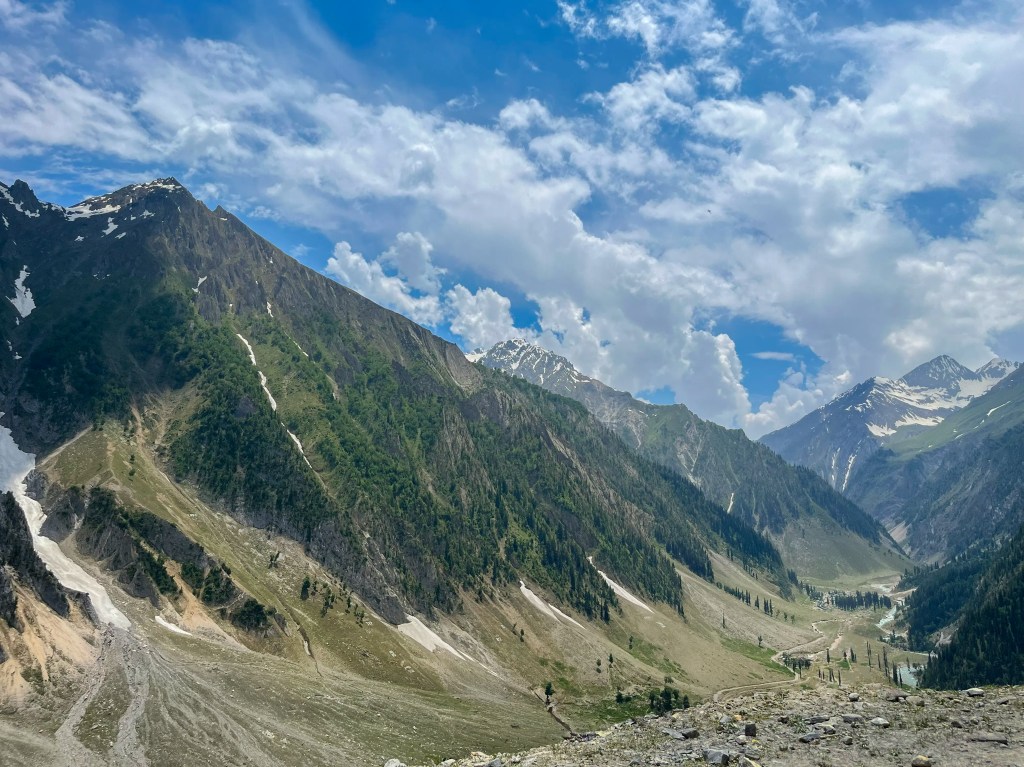 Baltal Valley with steep mountain slopes and winding road during the climb to Zoji La Ladakh