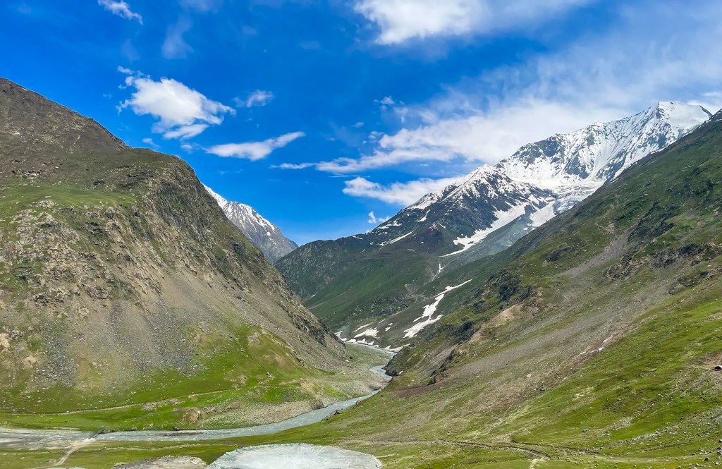 Rocky mountain terrain with steep slopes and glacial streams near Drass Ladakh